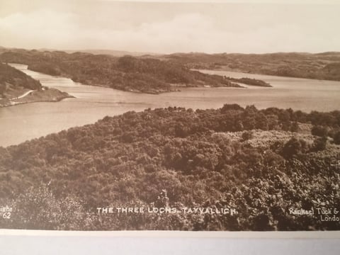 Sepia-toned aerial landscape view of The Three Locks tavern area with forested hills and a winding river or waterway